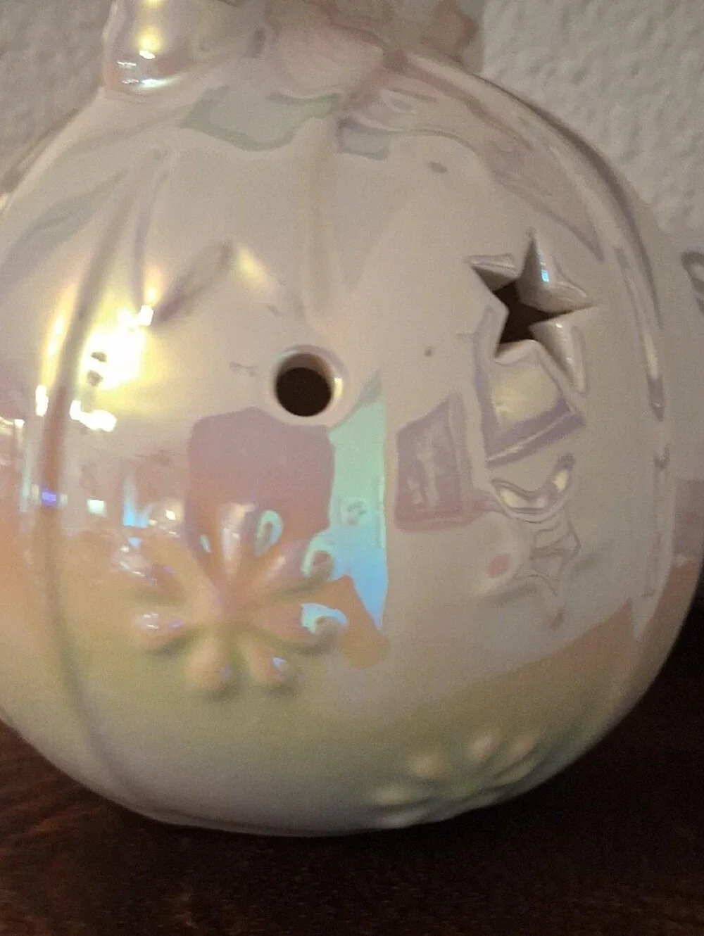 Iridescent White Ceramic Lantern with Star Cutouts and Bow Accent